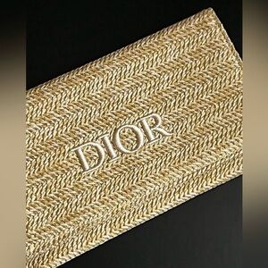 Authentic D Raffia clutch bag